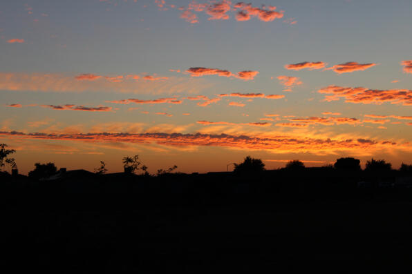 sunset in a town